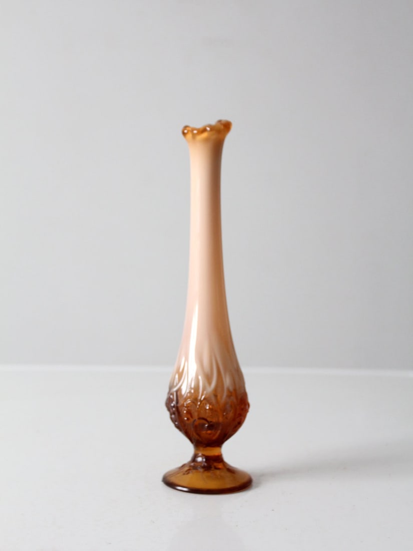 Fenton Lily of the Valley Opalescent Bud Vase 11 Inch Vintage: Fenton Lily of the Valley Opalescent Bud Vase 11 Inch Vintage This vintage Fenton bud vase features the exquisite "Lily of the Valley" design, masterfully crafted from pale pink opalescent glass. The