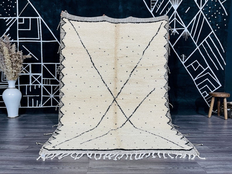 Authentic Handwoven White Engraved Rug from Morocco: Authentic Handwoven White Engraved Rug from Morocco Discover the charm of this authentic White Engraved Rug, beautifully handwoven in the Atlas Mountains by skilled Berber women weavers. Crafted using