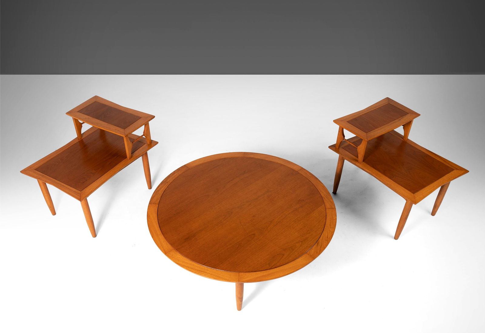 Mid-Century Modern Pecan Coffee Table and 2-Tier End Tables by Lubberts & Mulder: Mid-Century Modern Pecan Coffee Table and 2-Tier End Tables by Lubberts & Mulder This exquisite set features a round coffee table and a pair of 2-tier end tables, attributed to Lubberts & Mulder for T