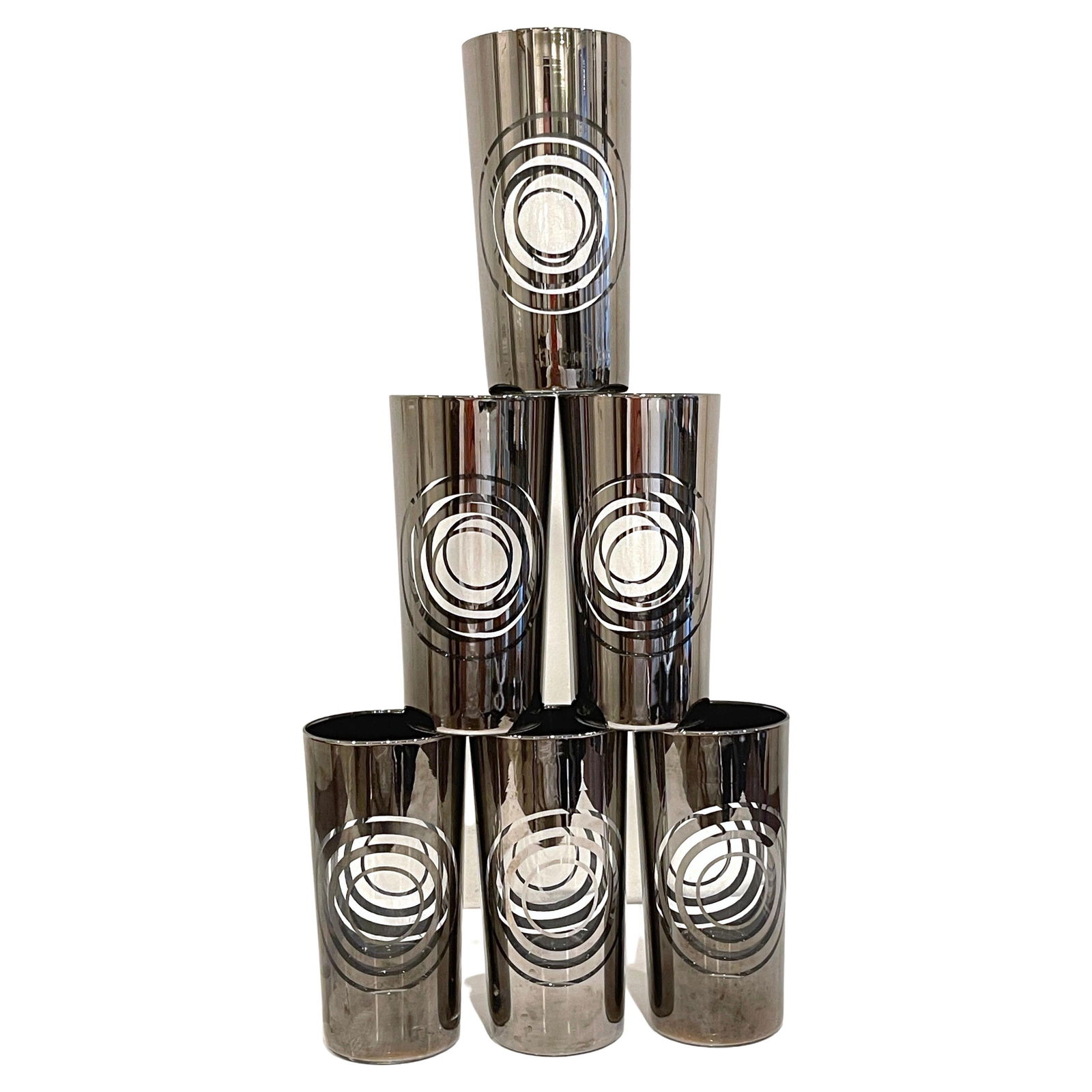 1970s Set of 6 Silvered MOD Highball Glasses with Infiniti Orb Design: 1970s Set of 6 Silvered MOD Highball Glasses with Infiniti Orb Design This set of six 1970s silvered MOD highball glasses is a stunning example of Mid-Century Modern barware. Crafted from glass with a
