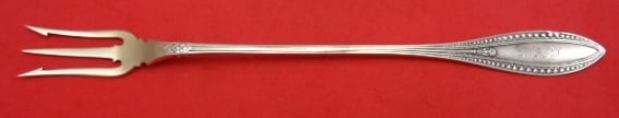 Whiting Indian Sterling Silver Long Gold Washed Pickle Fork 7 5/8": Whiting Indian Sterling Silver Long Gold Washed Pickle Fork 7 5/8" This exquisite serving fork is part of the 'Indian' pattern by Whiting, crafted from sterling silver and beautifully gold washed. The