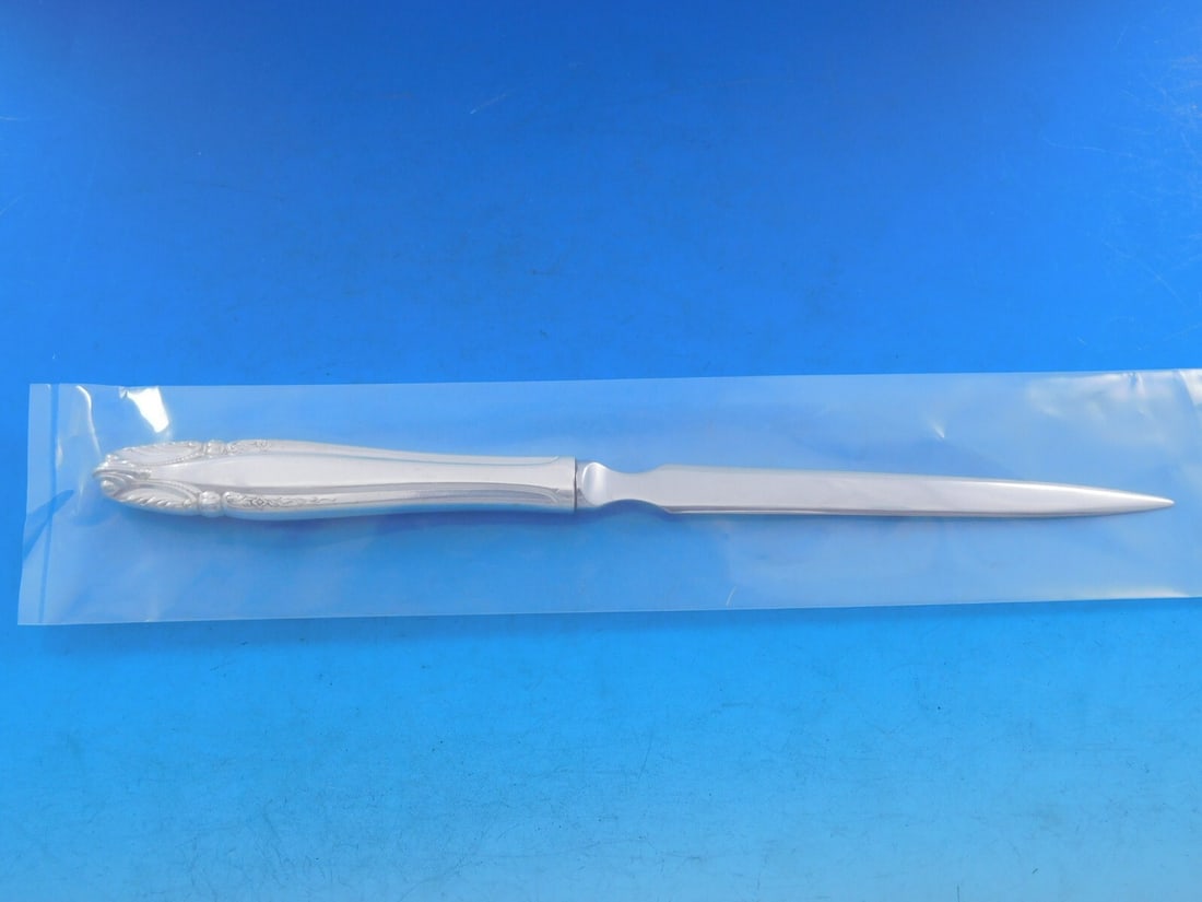 Wallace Stradivari Sterling Silver Letter Opener Custom 9 1/4 Inch: Wallace Stradivari Sterling Silver Letter Opener Custom 9 1/4 Inch This elegant letter opener features the Stradivari pattern by Wallace, crafted from high-quality sterling silver with a stainless ste