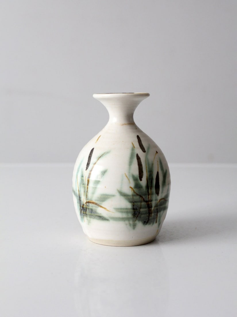 Studio Art Pottery Vase with Botanical Motif by Clouds of Folsom: Studio Art Pottery Vase with Botanical Motif by Clouds of Folsom This vintage handmade studio pottery vase by Clouds of Folsom features a balanced form with a narrow neck and a painterly botanical mot