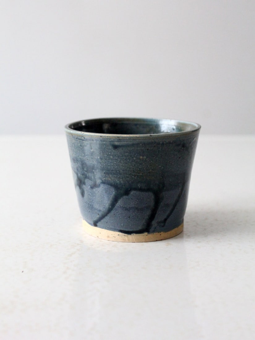 Artist Signed Vintage Studio Pottery Vase with Steely Blue Glaze: Artist Signed Vintage Studio Pottery Vase with Steely Blue Glaze Discover this exquisite vintage studio pottery vase, a unique piece signed by the artist. This handmade cachepot features a stunning st