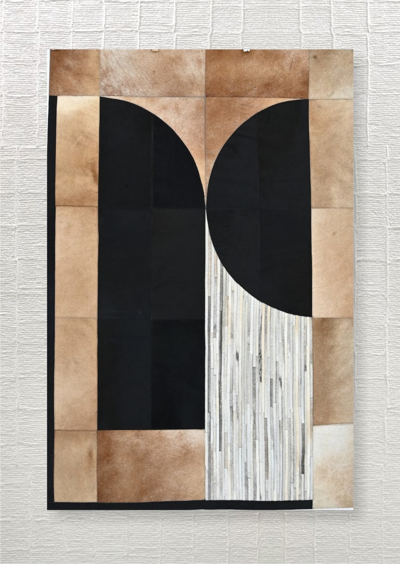 Modern Geometric Hand Stitched Cowhide Leather Area Rug 3ft x 5ft: Modern Geometric Hand Stitched Cowhide Leather Area Rug 3ft x 5ft Free continental US Shipping This modern geometric area rug showcases a striking patchwork design, meticulously hand-stitched from 100