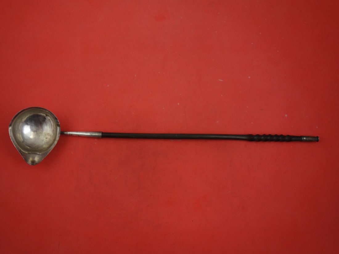 Thomas Shepherd Georgian Sterling Silver Toddy Ladle 16" Ebony Handle: Thomas Shepherd Georgian Sterling Silver Toddy Ladle 16" Ebony Handle This exquisite English Georgian toddy ladle, crafted by Thomas Shepherd in 1773, showcases a beautiful blend of sterling silver an