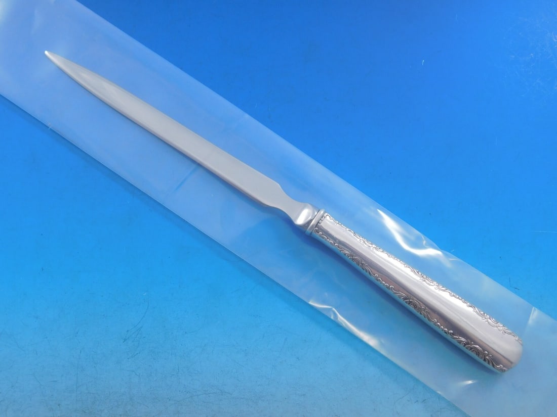Gorham Camellia Sterling Silver Letter Opener 9 1/4 Custom Made: Gorham Camellia Sterling Silver Letter Opener 9 1/4 Custom Made This elegant letter opener features a stunning Camellia pattern by Gorham, crafted from high-quality sterling silver. The piece showcase
