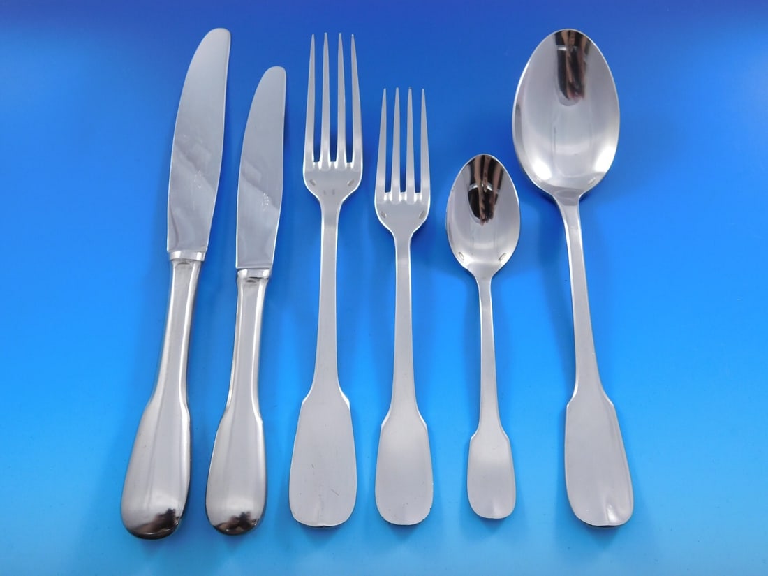 Novargent Fiddle Stainless Steel Flatware Set 72 pcs with Wooden Caddy: Novargent Fiddle Stainless Steel Flatware Set 72 pcs with Wooden Caddy Enhance your dining experience with this elegant Fiddle flatware service set by Novargent, crafted in France. This modern stainle