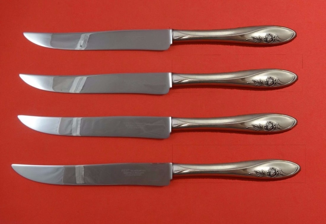 Towle Sculptured Rose Sterling Silver Steak Knife Set 4pc Texas Sized: Towle Sculptured Rose Sterling Silver Steak Knife Set 4pc Texas Sized Enhance your dining experience with this exquisite 4-piece steak knife set featuring the Sculptured Rose pattern by Towle. Each kn