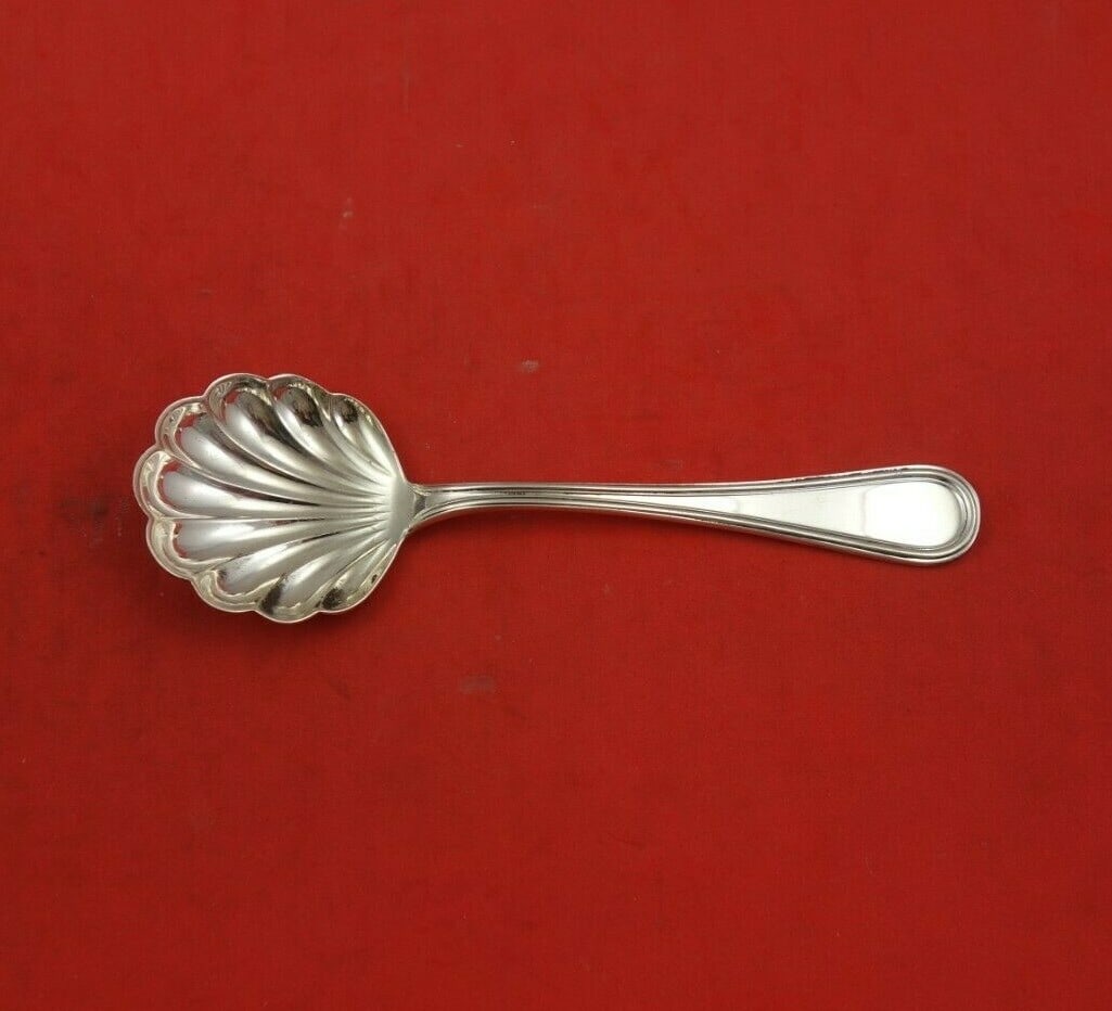 Zaramella Argenti Giorgio Sterling Silver Sugar Spoon Shell 4 7/8": Zaramella Argenti Giorgio Sterling Silver Sugar Spoon Shell 4 7/8" This exquisite sugar spoon from the Giorgio pattern by Zaramella Argenti is crafted from high-quality sterling silver. Featuring a be