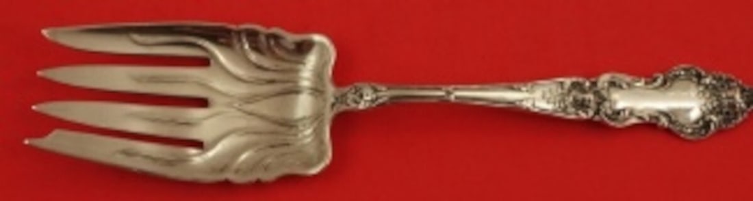Wallace Meadow Rose Sterling Silver Fish Serving Fork 7 3/4": Wallace Meadow Rose Sterling Silver Fish Serving Fork 7 3/4" This exquisite serving fork is a part of the Meadow Rose pattern by Wallace, crafted from high-quality sterling silver. Designed specifical