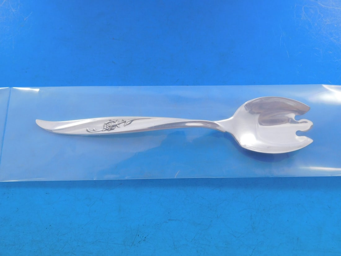 International Sterling Silver Rose Ballet Dessert Fork Custom 5 3/4 Inch: International Sterling Silver Rose Ballet Dessert Fork Custom 5 3/4 Inch Indulge in a touch of elegance with this sterling silver ice cream dessert fork from the Rose Ballet pattern by International.