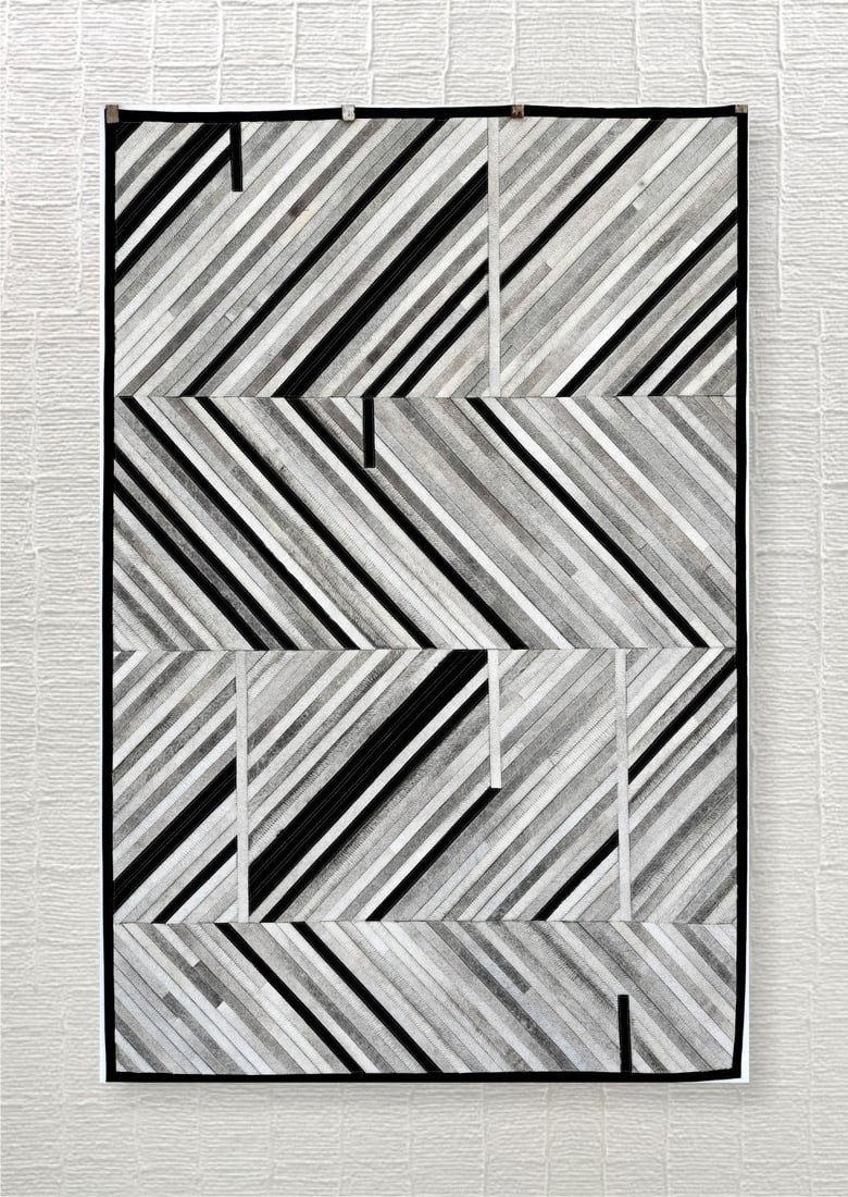 Modern Abstract Chevron Stripe Cowhide Leather Area Rug 3FT x 5FT: Modern Abstract Chevron Stripe Cowhide Leather Area Rug 3FT x 5FT Free continental US Shipping This modern area rug features an abstract chevron stripe pattern crafted from 100% genuine hair-on cowhid