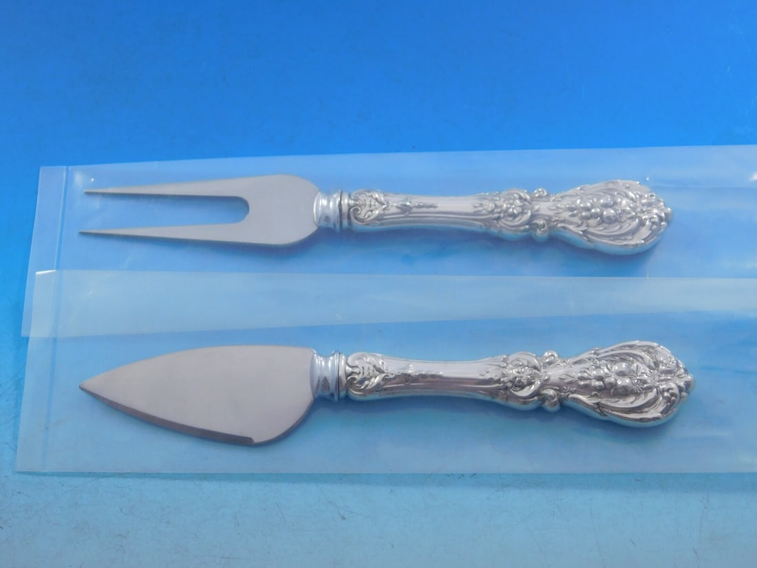 Reed and Barton Francis I Sterling Silver Cheese Serving Set 2pc Custom: Reed and Barton Francis I Sterling Silver Cheese Serving Set 2pc Custom Enhance your cheese serving experience with this exquisite 2-piece hard cheese serving set from the renowned Francis I pattern b