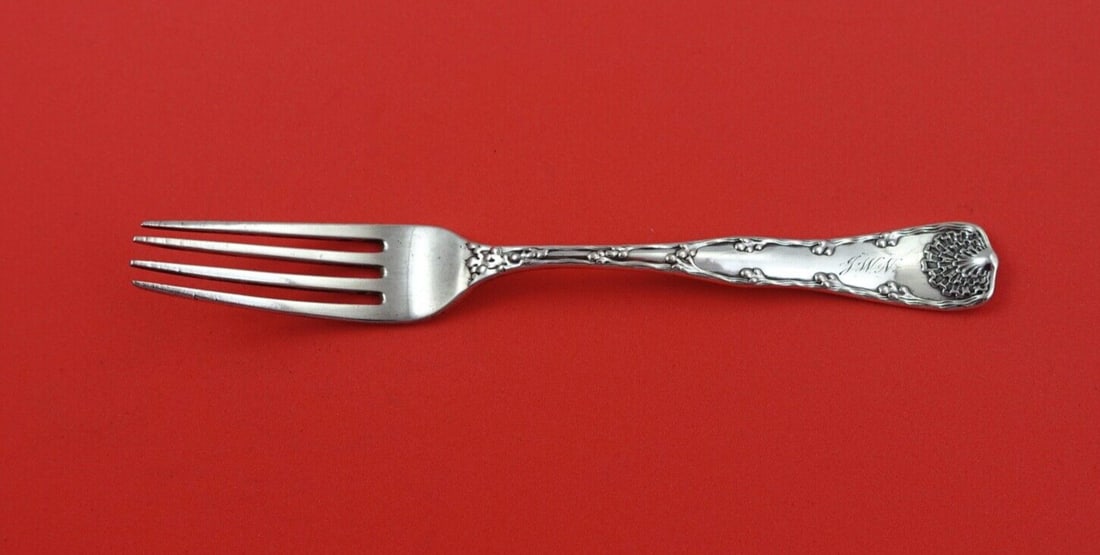 Tiffany & Co. Wave Edge Sterling Silver Tea Fork 6 3/8": Tiffany & Co. Wave Edge Sterling Silver Tea Fork 6 3/8" This exquisite tea fork from Tiffany & Co. features the elegant Wave Edge pattern, crafted from high-quality sterling silver. Measuring 6 3/8 in