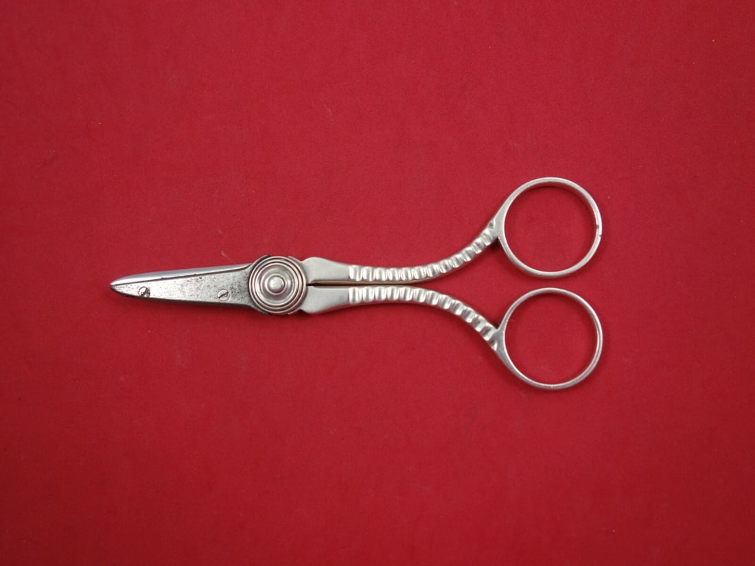 Gorham Sterling Silver Grape Shears Art Deco Style Vintage #80 5 3/8": Gorham Sterling Silver Grape Shears Art Deco Style Vintage #80 5 3/8" Enhance your vintage collection with these exquisite Gorham Sterling Silver Grape Shears, featuring a stylish Art Deco design. Mea