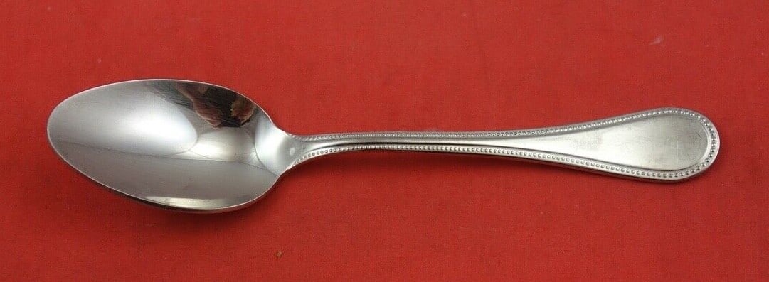 Christofle Ondine Stainless Steel Teaspoon Modern Design 6 1/8": Christofle Ondine Stainless Steel Teaspoon Modern Design 6 1/8" This elegant Ondine teaspoon by Christofle is crafted from high-quality stainless steel, showcasing a modern design. Measuring 6 1/8 inc