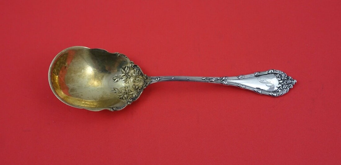 Durgin Madame Royale Sterling Silver Preserve Spoon Gold Washed 7 3/8": Durgin Madame Royale Sterling Silver Preserve Spoon Gold Washed 7 3/8" This exquisite serving spoon is a sterling silver preserve spoon from the esteemed Durgin company, featuring the elegant Madame R