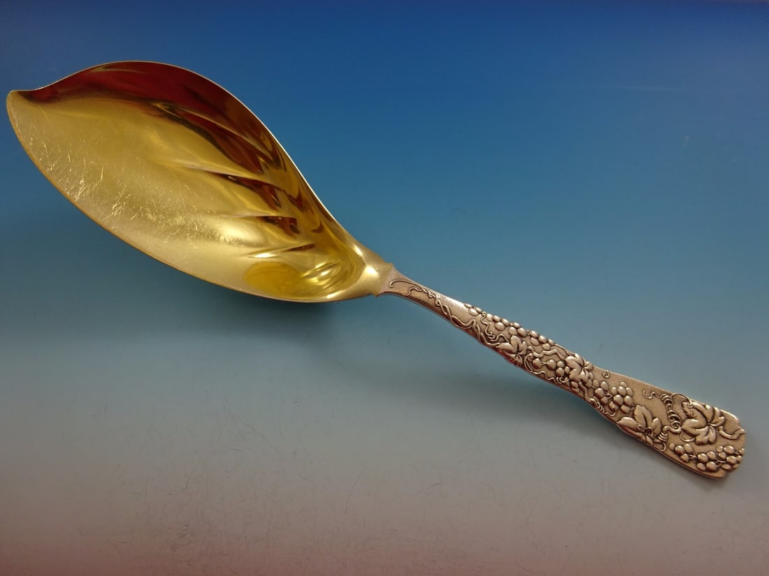 Tiffany & Co Vine Sterling Silver Ice Cream Server 11.25" Gold Wash Grapes: Tiffany & Co Vine Sterling Silver Ice Cream Server 11.25" Gold Wash Grapes This exquisite ice cream server from Tiffany and Co. showcases the elegant Vine pattern, crafted from high-quality sterling s