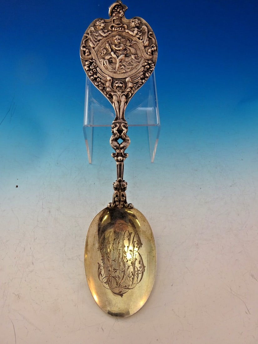 Tiffany & Co. Sterling Silver Bonbonniere Serving Spoon Cherub 11 1/2": Tiffany & Co. Sterling Silver Bonbonniere Serving Spoon Cherub 11 1/2" Experience the elegance of this stunning vintage Tiffany & Co. Sterling Silver Bonbonniere Serving Spoon, crafted between 1850 an