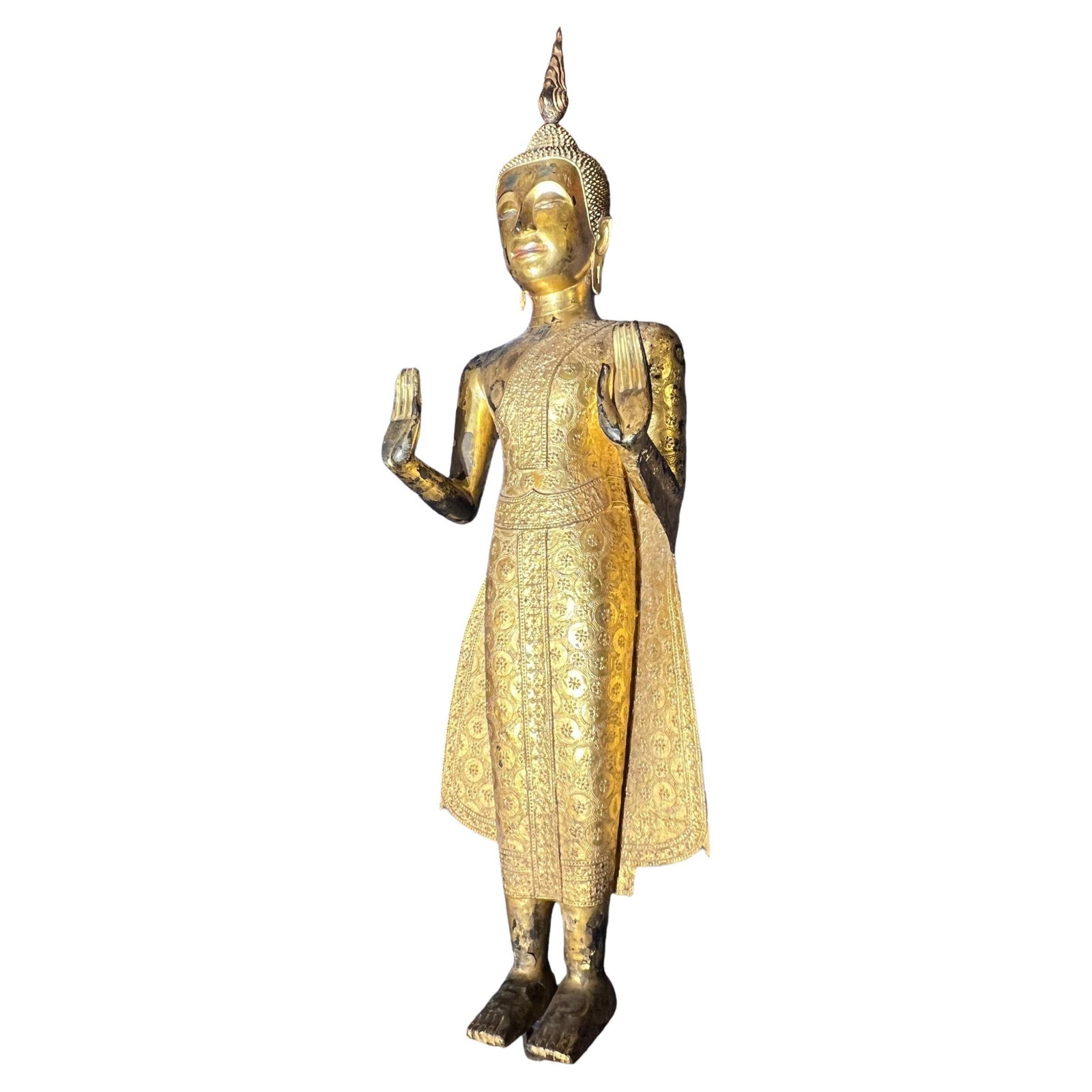 49 Inch 19th Century Gilt Bronze Pang Ham Yati Standing Sculpture Thailand: 49 Inch 19th Century Gilt Bronze Pang Ham Yati Standing Sculpture Thailand This exceptional 19th-century gilt bronze statue depicts the standing Pang Ham Yati, also known as the Monday Buddha, from Th