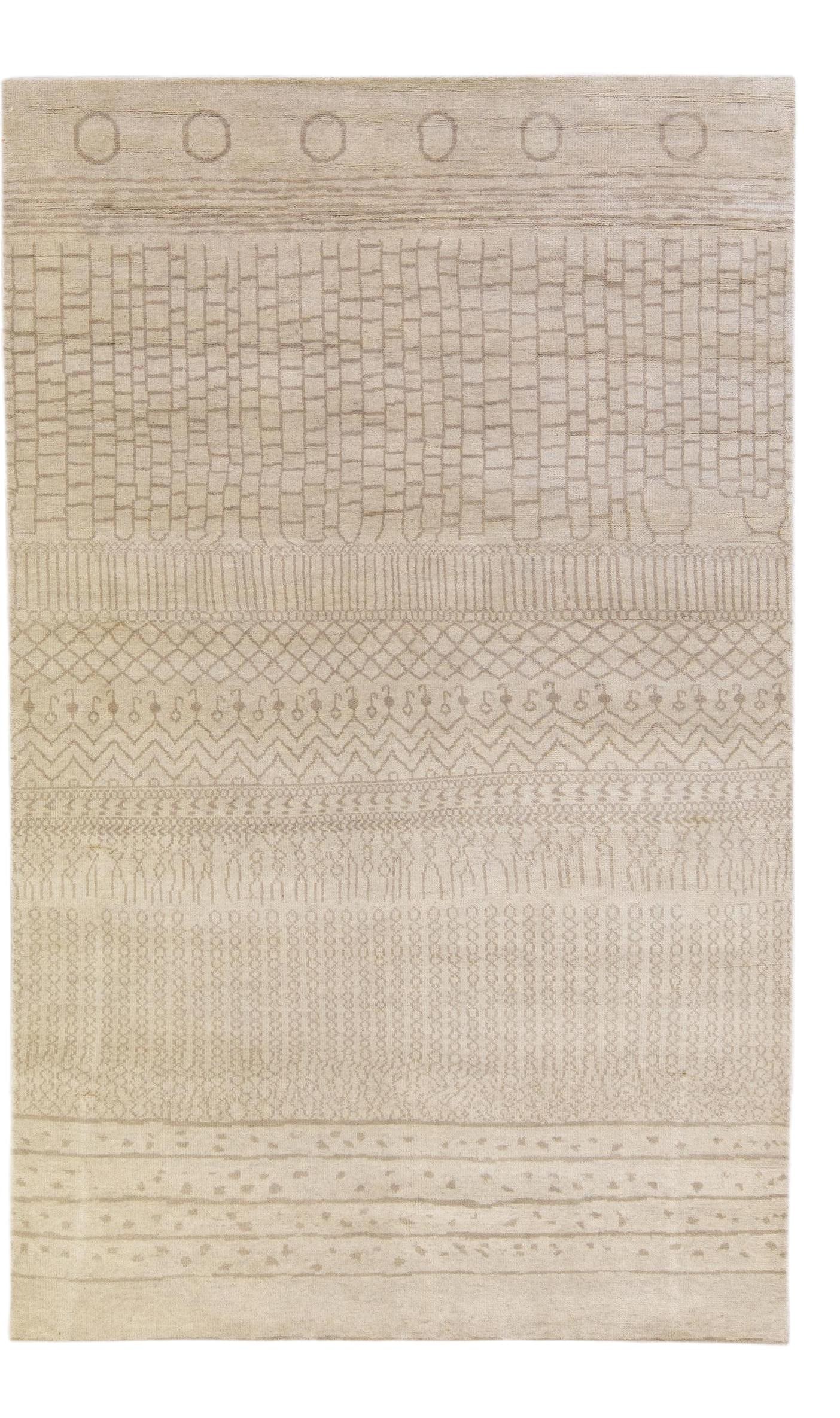 Handmade Beige Wool Rug Modern Moroccan Geometric Design 7'4" x 11'9": Handmade Beige Wool Rug Modern Moroccan Geometric Design 7'4" x 11'9" Transform your space with this stunning Modern Moroccan Style Handmade Beige Wool Rug. Featuring a beautiful beige field adorned w