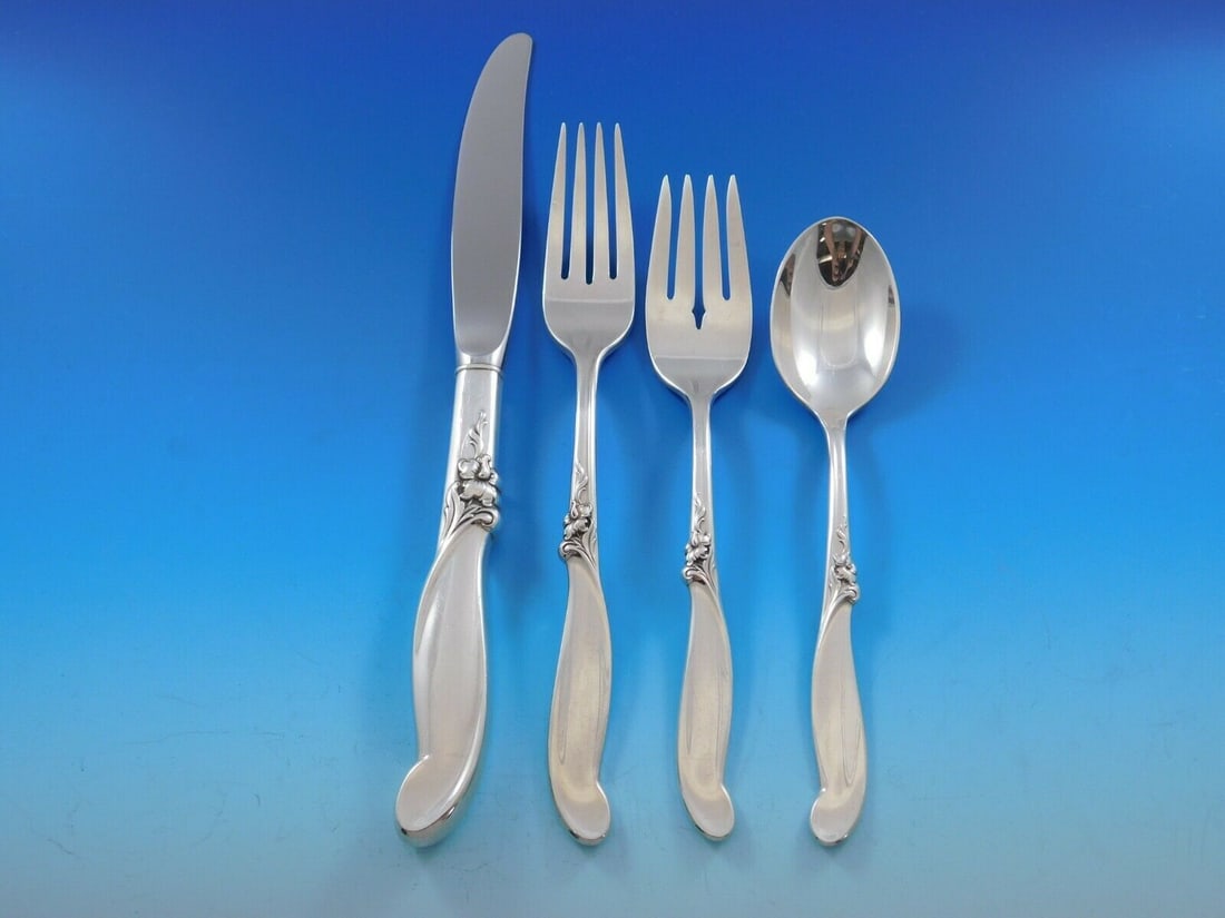International Silver Silver Melody 4pc Sterling Silver Place Setting: International Silver Silver Melody 4pc Sterling Silver Place Setting This exquisite 4-piece place setting in the Silver Melody pattern by International Silver is crafted from high-quality sterling sil
