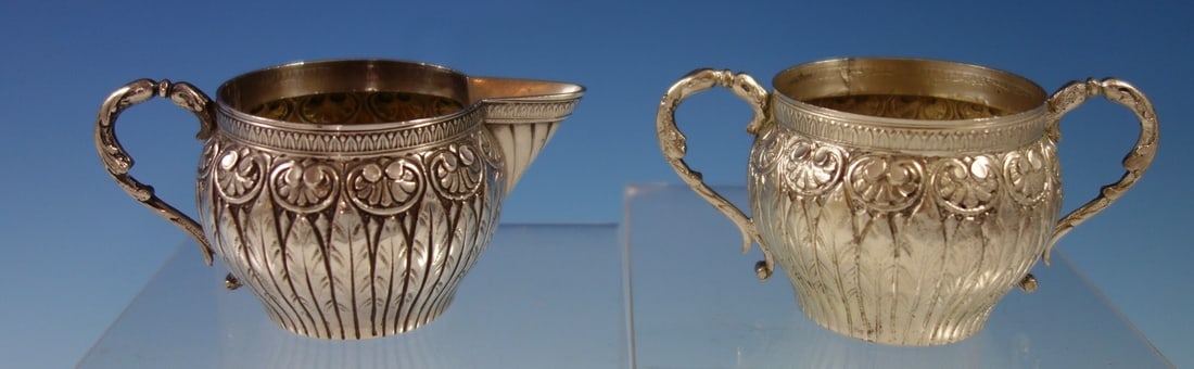 Fratelli Coppini Italian 800 Silver Repoussed Sugar and Creamer Set 2pc: Fratelli Coppini Italian 800 Silver Repoussed Sugar and Creamer Set 2pc This elegant 2-piece sugar and creamer set by Fratelli Coppini is crafted from Italian .800 silver featuring detailed repoussed