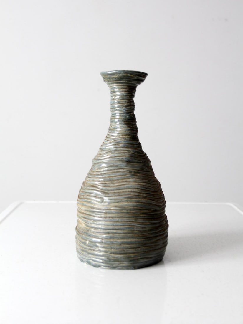 Signed Vintage Studio Pottery Vase Seafoam Green Glaze 12.5 Inch: Signed Vintage Studio Pottery Vase Seafoam Green Glaze 12.5 Inch This vintage studio pottery vase showcases a unique hand-crafted design featuring a striking slab strand swirling construction and a be