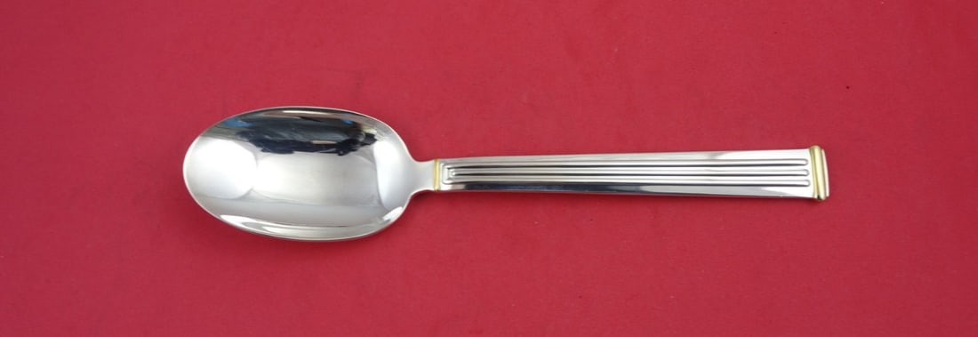 Christofle Triade Gold Accent Silverplate Dinner Spoon 8.25": Christofle Triade Gold Accent Silverplate Dinner Spoon 8.25" This elegant dinner spoon features the Triade Gold Accent pattern by Christofle, crafted from high-quality silverplate. Measuring 8 1/4 inc