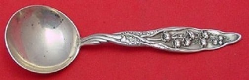 Whiting Sterling Silver Lily of the Valley Bouillon Spoon 5 Inch Wide Handle: Whiting Sterling Silver Lily of the Valley Bouillon Spoon 5 Inch Wide Handle Indulge in the elegance of the Lily of the Valley bouillon soup spoon by Whiting. Crafted from high-quality sterling silver