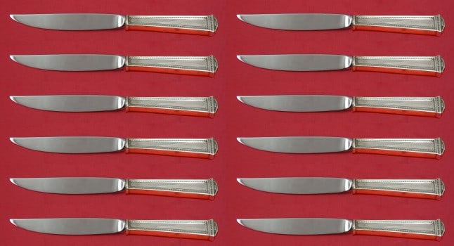 Set of 12 Pantheon Sterling Silver Steak Knives by International 8 Inch: Set of 12 Pantheon Sterling Silver Steak Knives by International 8 Inch Enhance your dining experience with this exquisite set of 12 Pantheon steak knives by International Sterling. Each knife feature