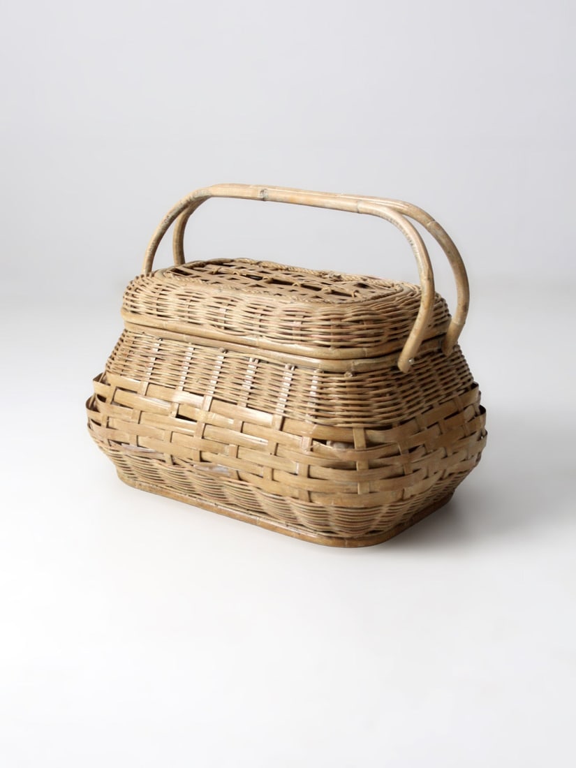Woven Midcentury Picnic Basket with Quilted Floral Lining and Bentwood Handles: Woven Midcentury Picnic Basket with Quilted Floral Lining and Bentwood Handles This mid-century picnic basket features a beautifully woven wicker exterior with bentwood swing handles and a gently dome