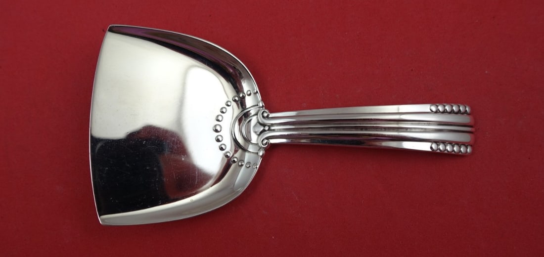 Tiffany & Co Sterling Silver Petit Four Server Unknown Pattern 4 5/8": Tiffany & Co Sterling Silver Petit Four Server Unknown Pattern 4 5/8" Discover this elegant Petit Four Server by Tiffany & Co., crafted from high-quality sterling silver. This exquisite serving piece
