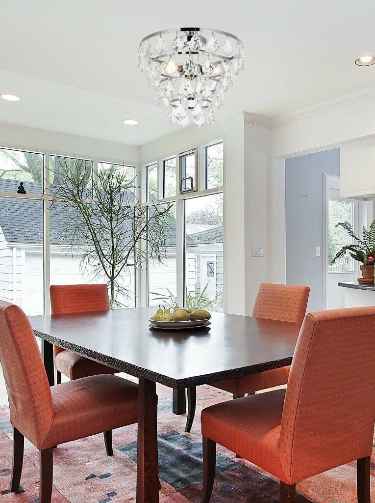 Living District Ella 3-Light 16 Inch Chrome Crystal Flush Mount Ceiling Chandelier: Living District Ella 3-Light 16 Inch Chrome Crystal Flush Mount Ceiling Chandelier This modern flush mount chandelier features three lights and a polished chrome finish. Designed with high-quality gla