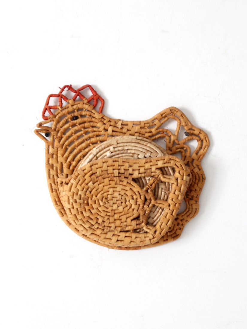 Vintage Rooster Trivet Caddy with 4 Matching Woven Trivets: Vintage Rooster Trivet Caddy with 4 Matching Woven Trivets This charming vintage woven trivet caddy, designed in the shape of a rooster, includes four matching woven trivets. Its delightful design enh