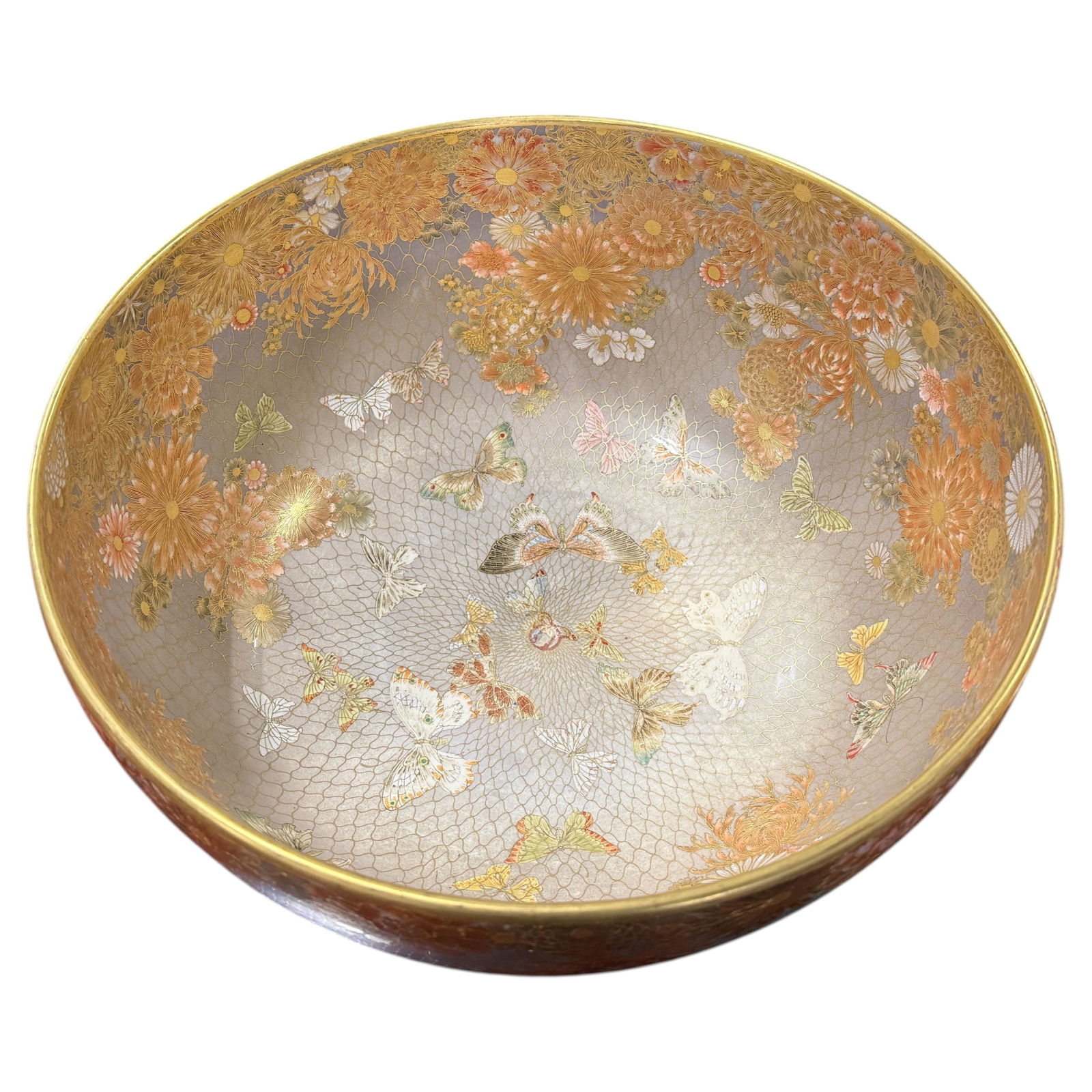 Kyoto Satsuma-Style Porcelain Bowl With Gilt Butterfly and Floral Motifs: Kyoto Satsuma-Style Porcelain Bowl With Gilt Butterfly and Floral Motifs This museum-quality Japanese porcelain bowl from Kyoto features gilt decoration with butterflies in a Satsuma style, dating to