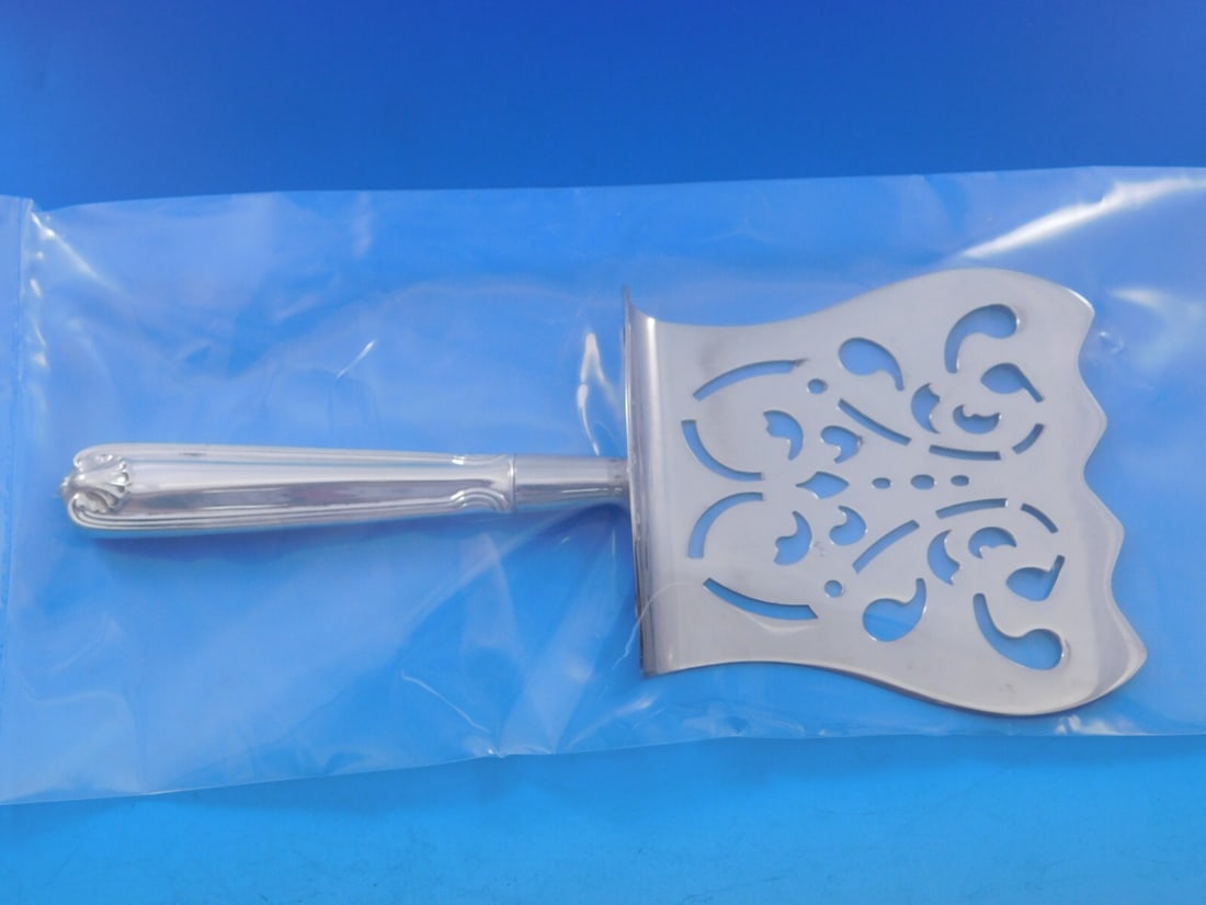 Frank Smith Sterling Silver Fiddle Shell Asparagus Server 8 3/4" Custom Made: Frank Smith Sterling Silver Fiddle Shell Asparagus Server 8 3/4" Custom Made This exquisite asparagus server is crafted by Frank Smith in the elegant Fiddle Shell pattern. Made from high-quality sterl