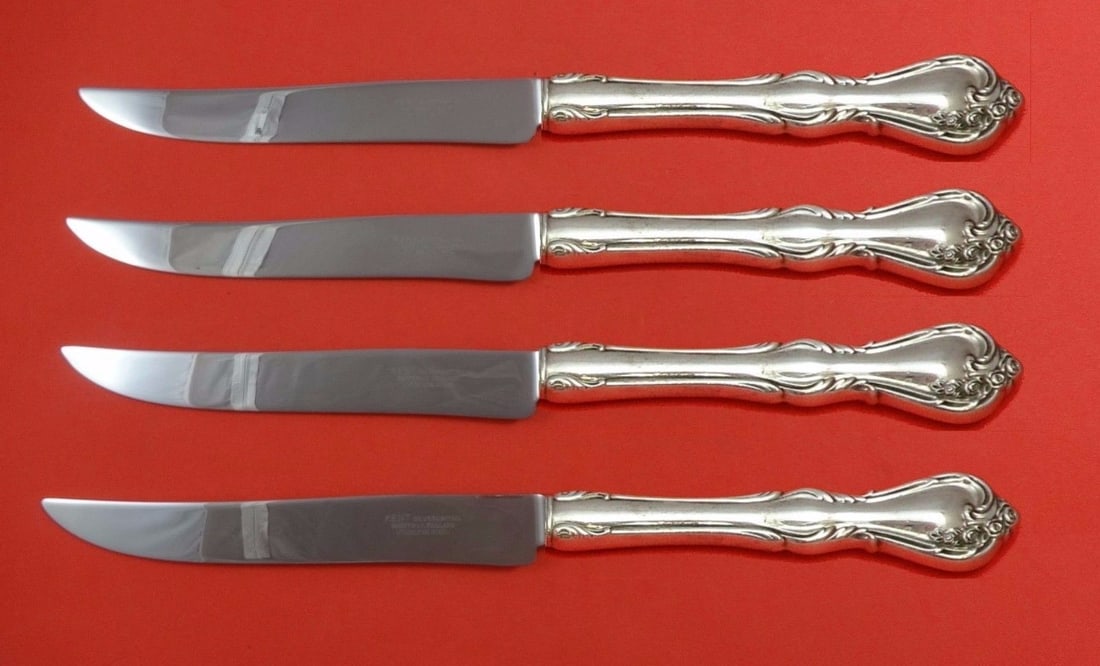 Rose Cascade Reed and Barton Sterling Silver Steak Knife Set 4 Pieces Texas Sized: Rose Cascade Reed and Barton Sterling Silver Steak Knife Set 4 Pieces Texas Sized Introducing the Rose Cascade Steak Knife Set by Reed and Barton, crafted from high-quality sterling silver. This impre