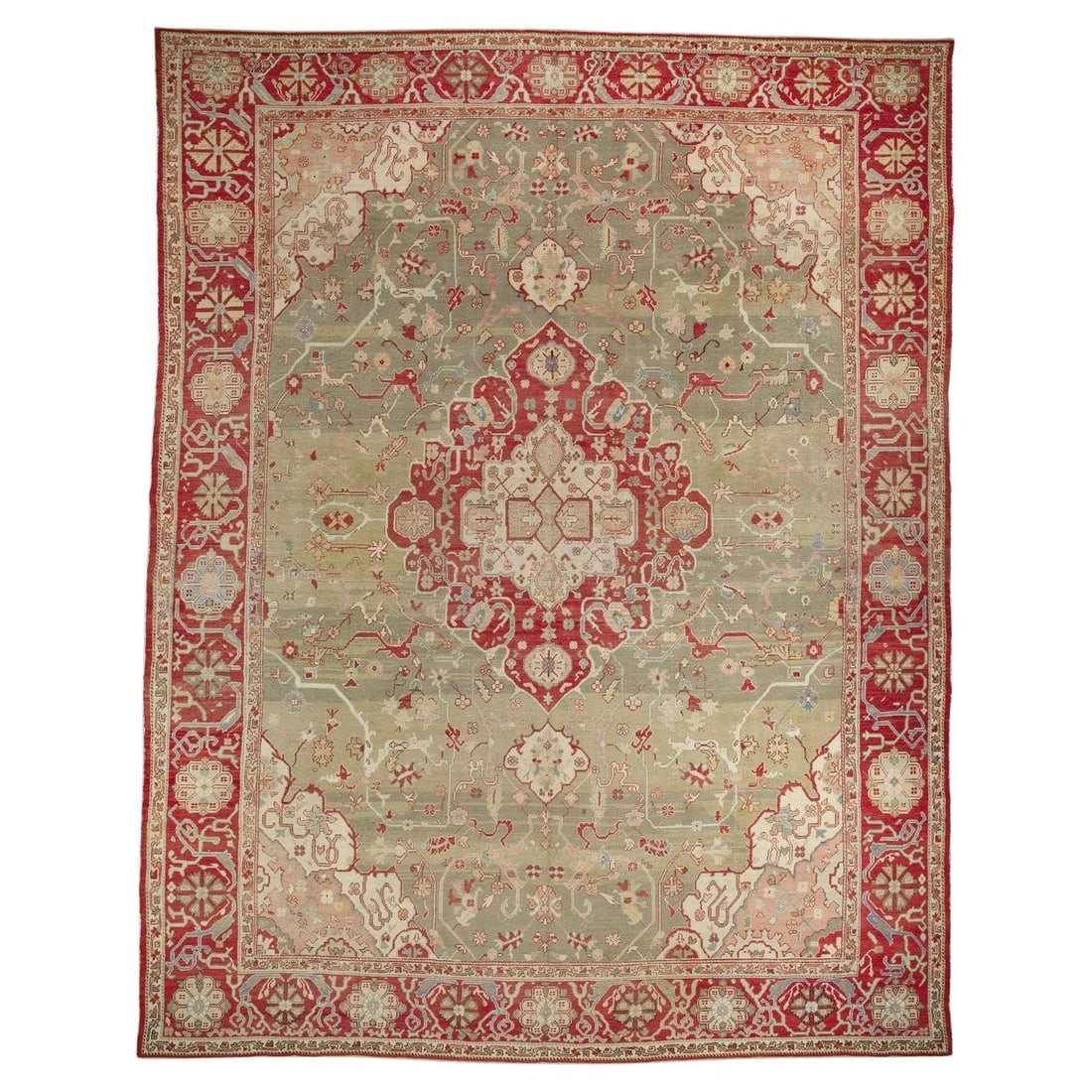 Forest Green and Red Wool Oushak Rug Handwoven in Turkey Late 19th Century: Forest Green and Red Wool Oushak Rug Handwoven in Turkey Late 19th Century This antique Turkish Oushak carpet from the late 19th century features a forest green ground with a cherry red medallion and