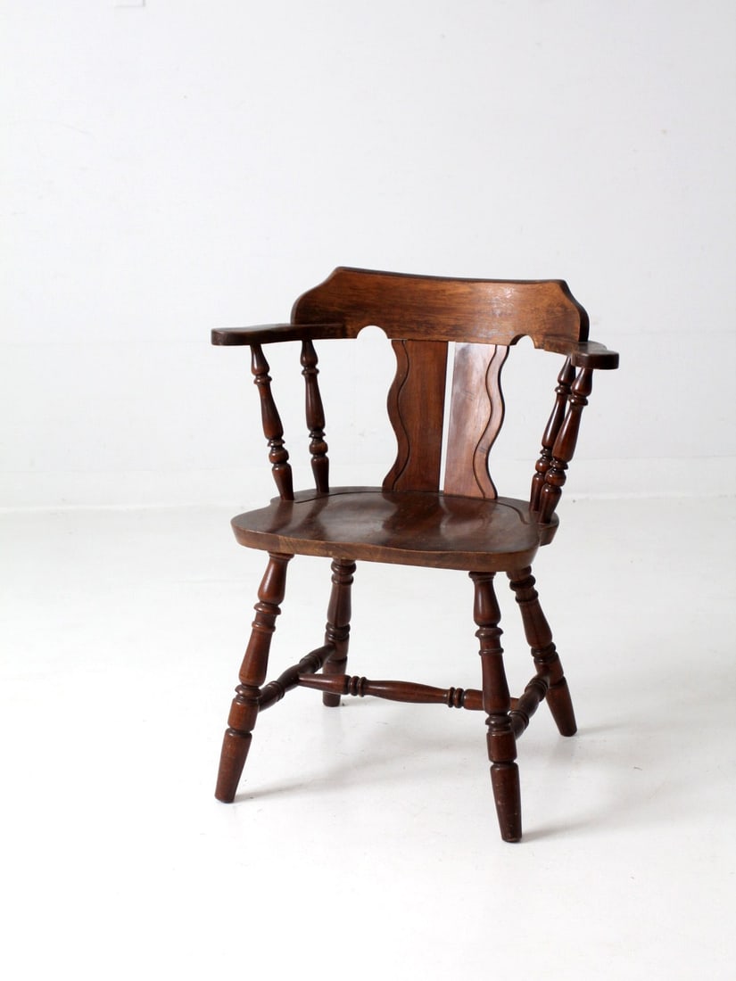 1970s Vintage Wood Tavern Armchair with Double Splat Back: 1970s Vintage Wood Tavern Armchair with Double Splat Back This vintage 1970s tavern armchair is a charming addition to any dining space. Crafted from wood, it features a classic captain's design with
