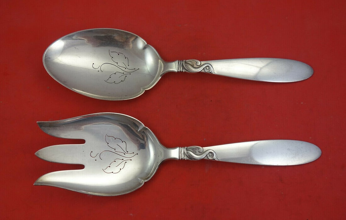 Frigast Dolphin Sterling Silver 2pc Vegetable Serving Set with Pierced Leaves: Frigast Dolphin Sterling Silver 2pc Vegetable Serving Set with Pierced Leaves Introducing the Dolphin by Frigast Sterling Silver Vegetable Serving Set, a stunning 2-piece collection featuring a fork a