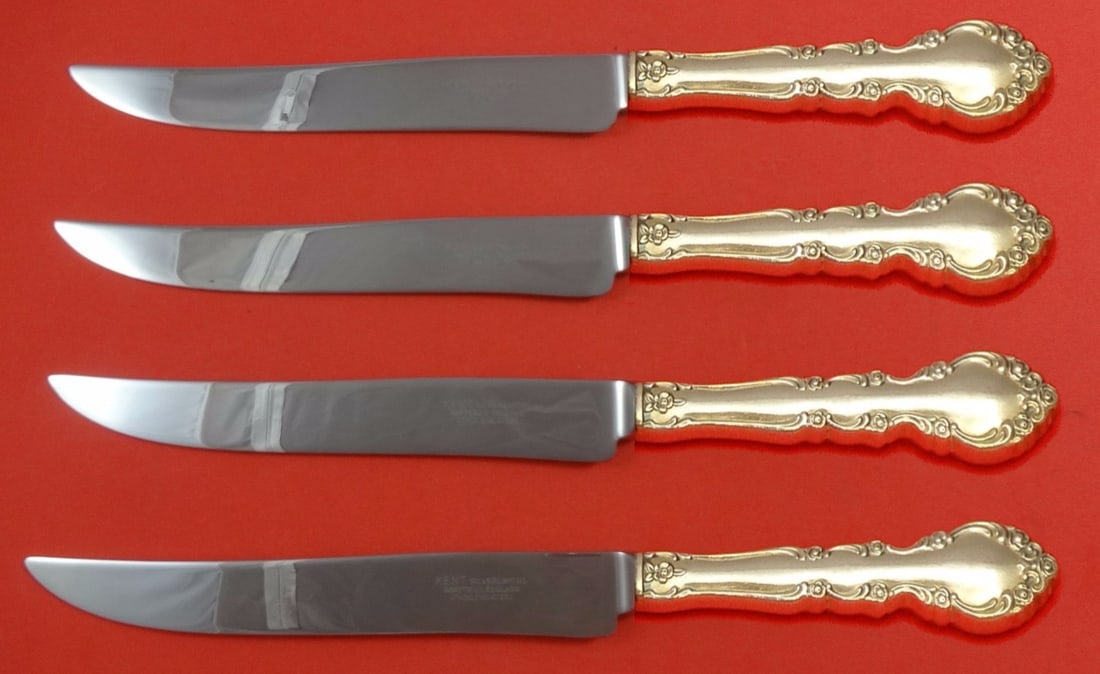Oneida Grandeur Sterling Silver Steak Knife Set 4pc Texas Sized: Oneida Grandeur Sterling Silver Steak Knife Set 4pc Texas Sized Enhance your dining experience with this impressive 4-piece steak knife set by Oneida, featuring the elegant Grandeur pattern. Each knif