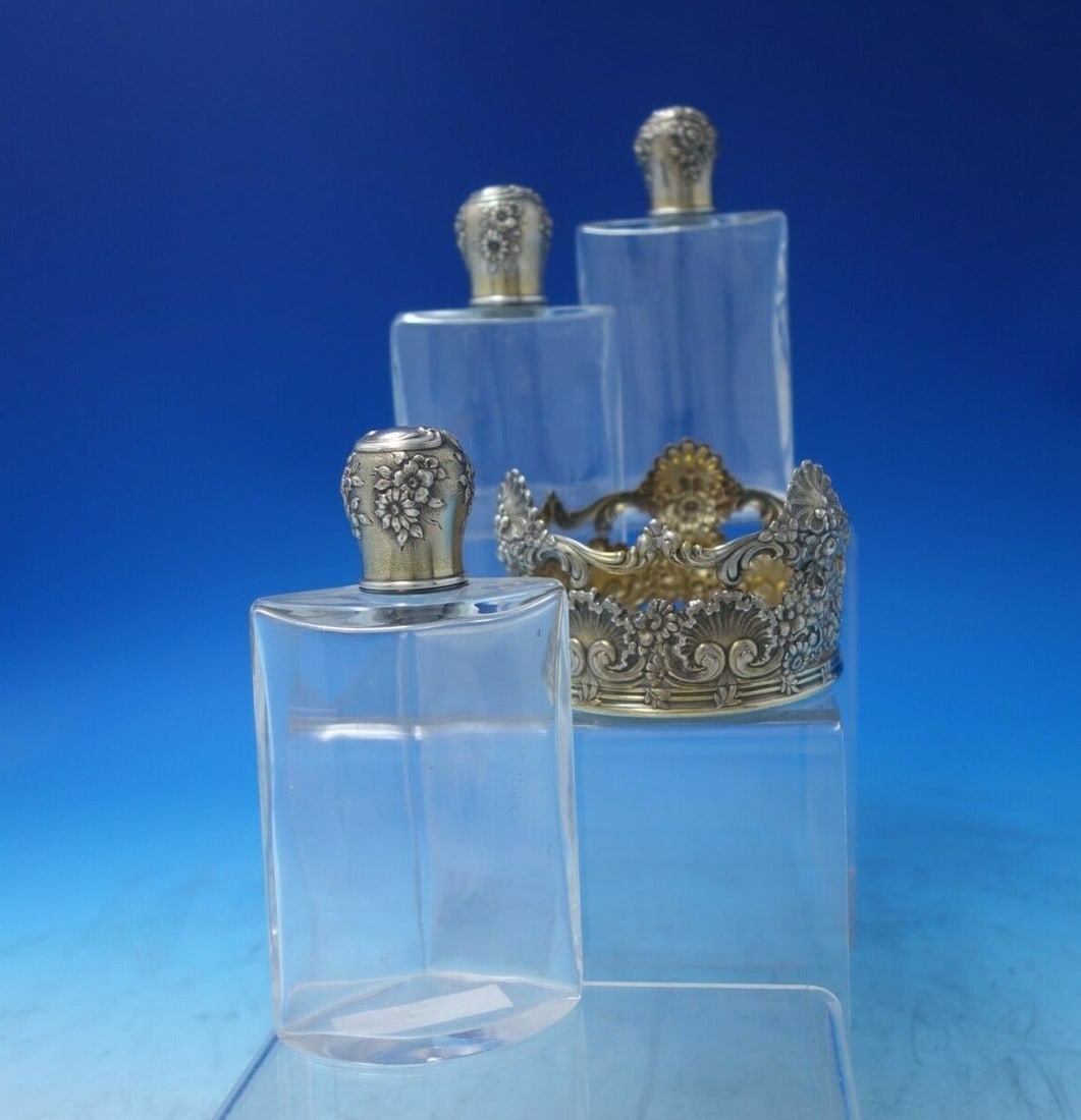 Tiffany & Co Wave Edge Sterling Silver Stand with 3 Bottles: Tiffany & Co Wave Edge Sterling Silver Stand with 3 Bottles Discover the elegance of the Wave Edge Stand by Tiffany & Co., crafted from high-quality sterling silver. This exquisite piece features a di