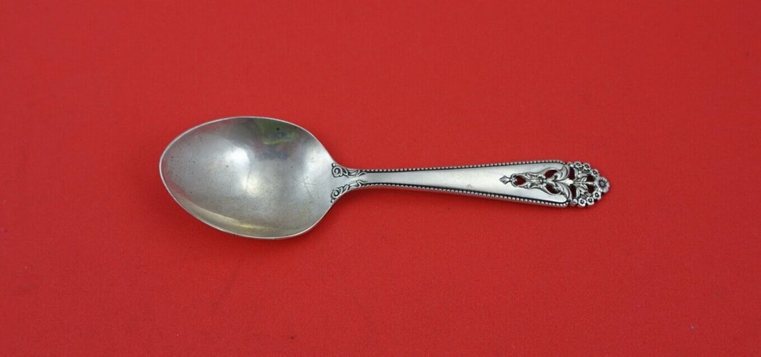 International Sterling Silver Queen's Lace Baby Spoon 4 1/4": International Sterling Silver Queen's Lace Baby Spoon 4 1/4" This exquisite baby spoon features the elegant Queen's Lace pattern by International Sterling. Crafted from high-quality sterling silver, t