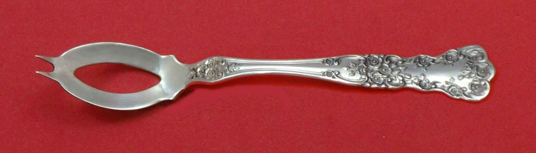 Gorham Buttercup Sterling Silver Olive Spoon Custom Made 5.5": Gorham Buttercup Sterling Silver Olive Spoon Custom Made 5.5" This exquisite Buttercup olive spoon by Gorham is crafted from high-quality sterling silver. The intricate floral motifs along the handle