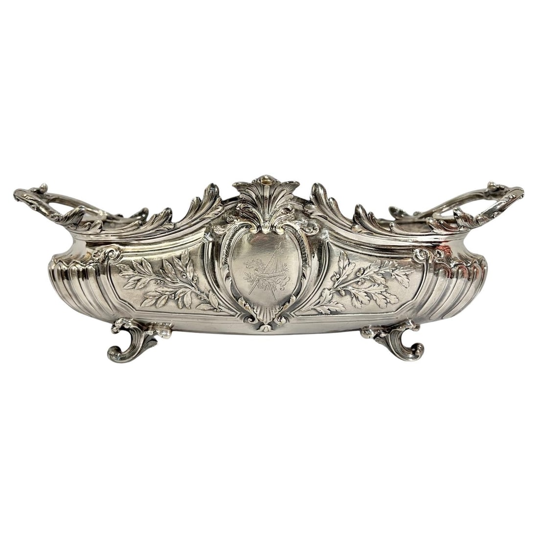 Neoclassical French Silvered Bronze Christofle Jardiniere with Engraved Crests: Neoclassical French Silvered Bronze Christofle Jardiniere with Engraved Crests This antique French centerpiece bowl or jardiniere by Christofle dates to the early 20th century. Crafted from bronze wit