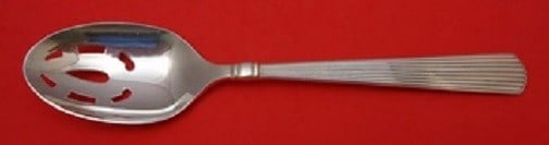 Reed and Barton Ashmont Sterling Silver Slotted Serving Spoon 8 3/4": Reed and Barton Ashmont Sterling Silver Slotted Serving Spoon 8 3/4" This exquisite Ashmont serving spoon by Reed and Barton is crafted from high-quality sterling silver, showcasing a beautiful pierce