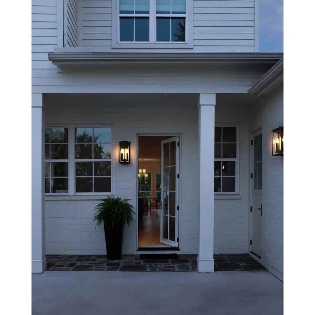 Kaysen 2-Light Black Outdoor Wall Lantern Iron and Glass 15 Inch Wet Rated: Kaysen 2-Light Black Outdoor Wall Lantern Iron and Glass 15 Inch Wet Rated This outdoor wall sconce features a traditional design with a black finish, constructed from durable iron and glass. The fixt