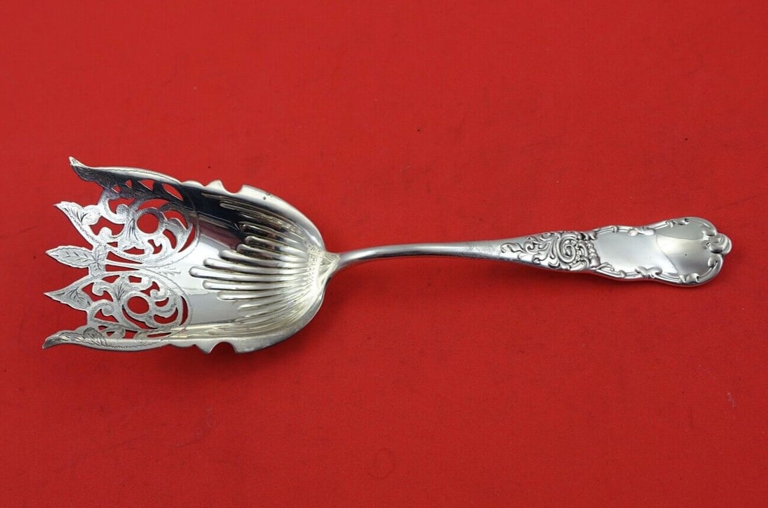 Lenox by Knowles Sterling Silver Brite-Cut Nut Scoop 7 3/8 Inch: Lenox by Knowles Sterling Silver Brite-Cut Nut Scoop 7 3/8 Inch This exquisite Lenox by Knowles Sterling Silver Nut Scoop is a beautifully crafted serving spoon measuring 7 3/8 inches. Featuring a bri